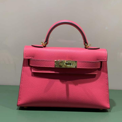 HERMÈS KELLY 20 BAG WITH GOLD HARDWARE IN PINK